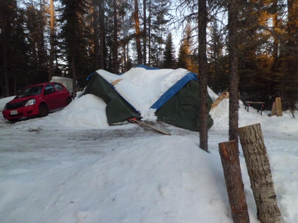 Collapsed army tent in winter.